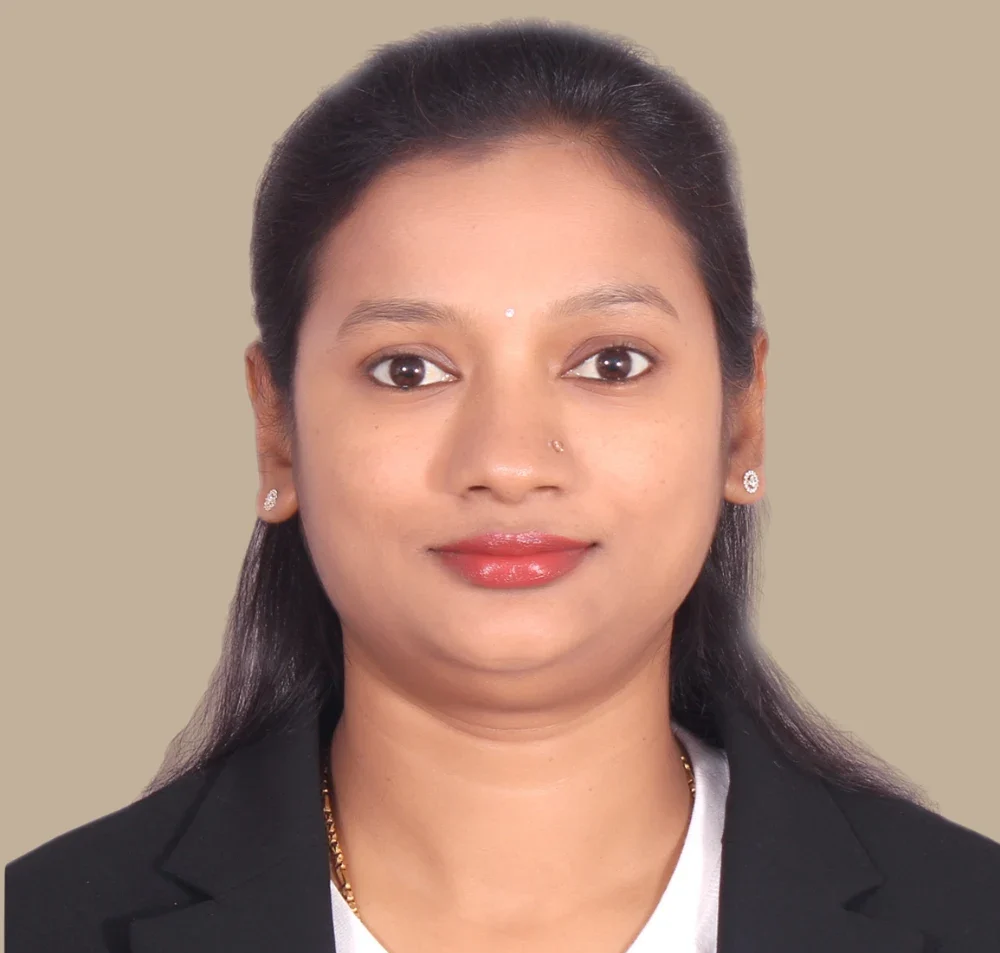 Aruna M
